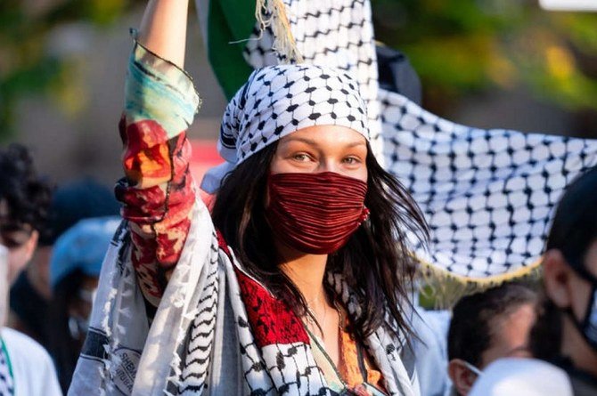 Bella Hadid participates in a pro-Palestinian march.